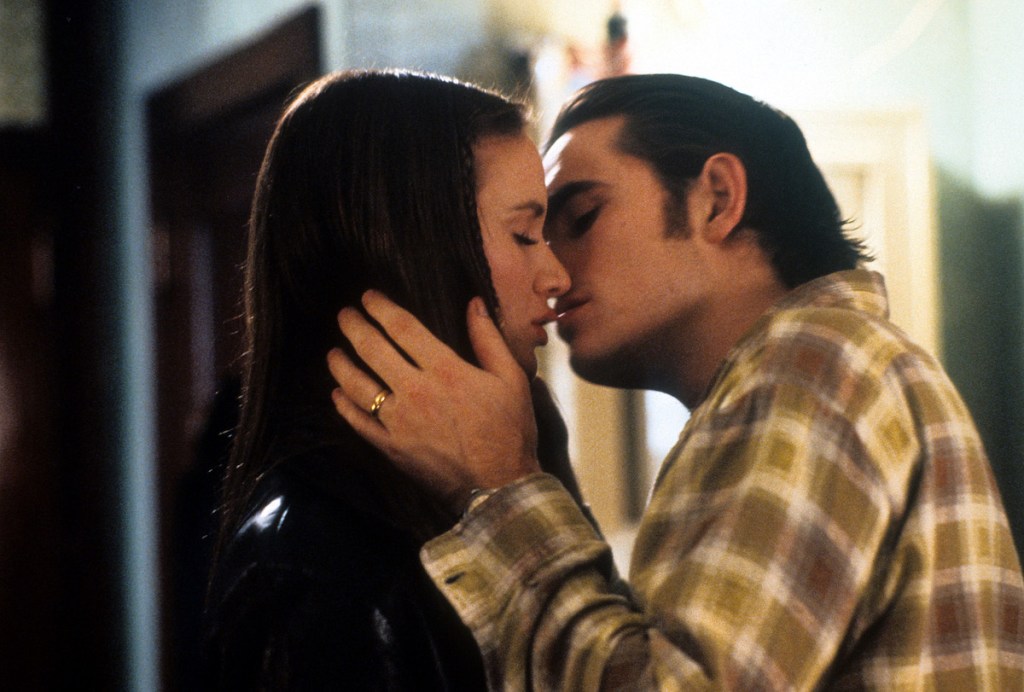 Kelly Lynch and kissing in a scene from the film 'Drugstore Cowboy', 1989