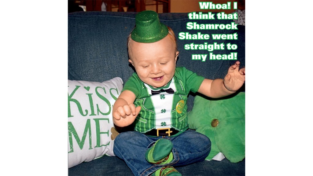 St. Patrick's Day Jokes: Baby in green looking like a party animal with caption, "Whoa! I think that Shamrock Shake went straight to my head!"