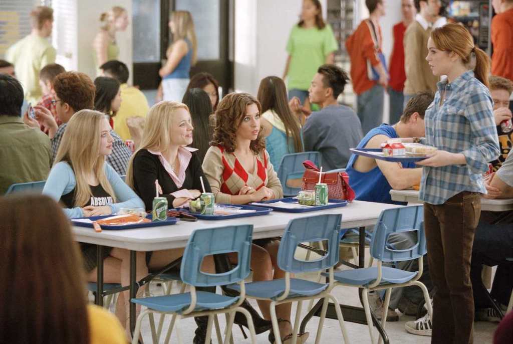 Left to right: Amanda Seyfried, Rachel McAdams, Lacey Chabert and Lindsay Lohan in the cafeteria in 'Mean Girls' 2004