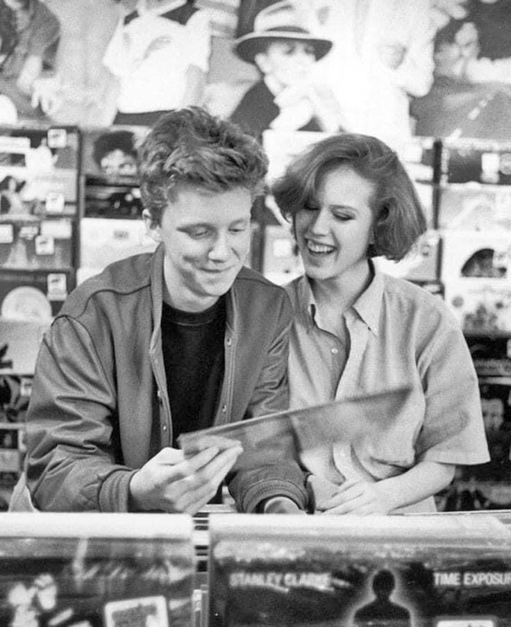 Anthony Michael Hall and Molly Ringwald at a record store during the making of 'Sixteen Candles' 1984