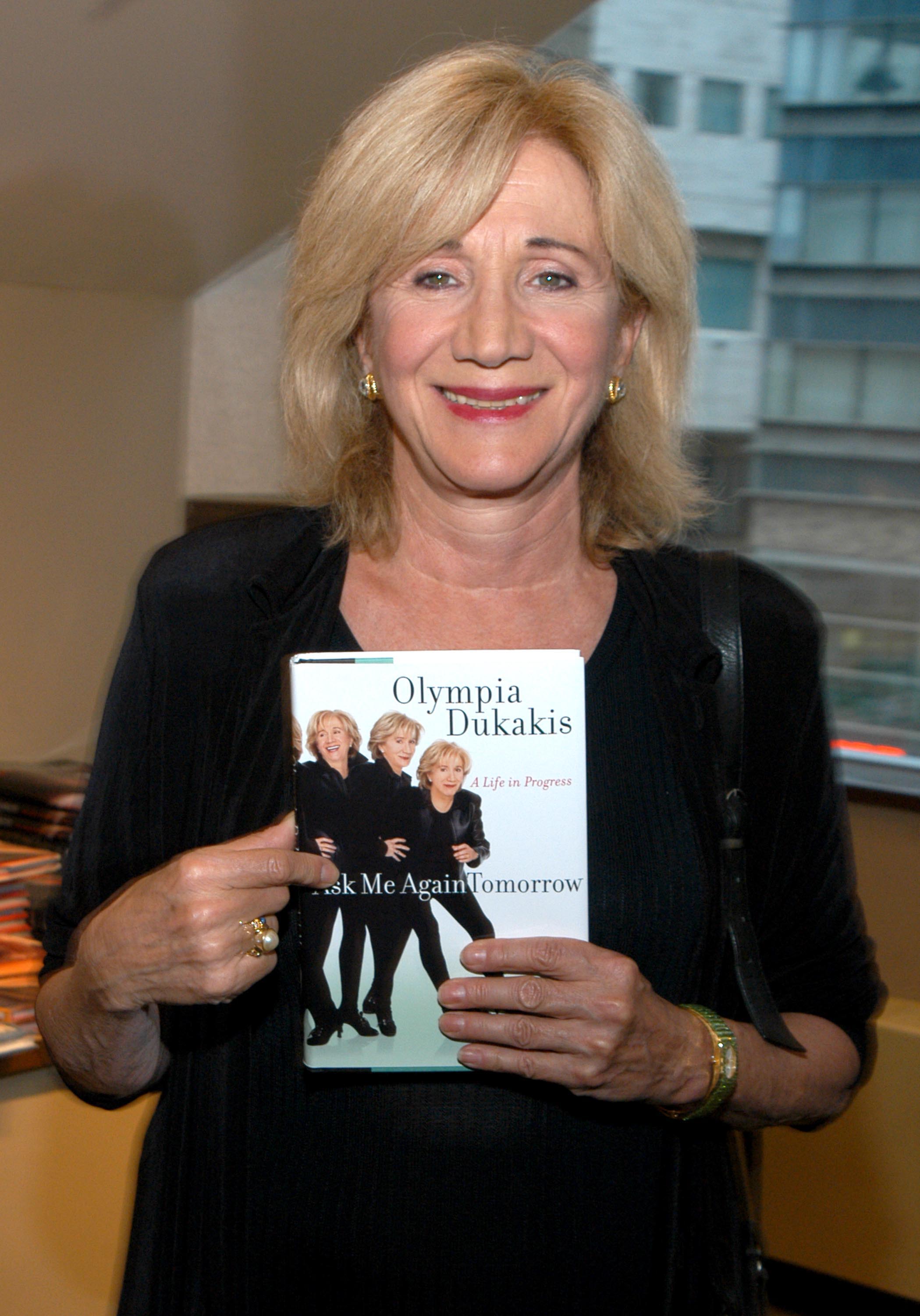 The actress with her book, 'Ask Me Again Tomorrow', 2003